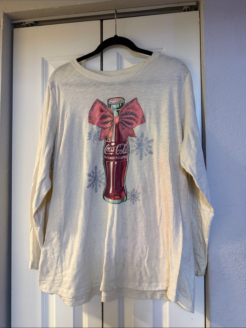 Coca-Cola Cream Tee with Red Bottle Accent and Pink Glitter Bow